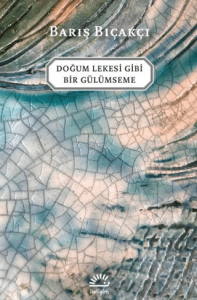 Doğum Lekesi Gibi Bir Gülümseme